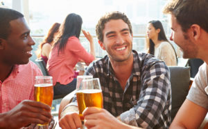 Men drinking and socializing