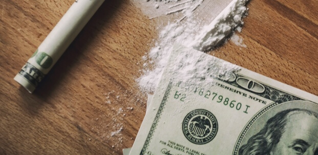 Signs of cocaine abuse include restlessness, dilated pupils and paranoia.