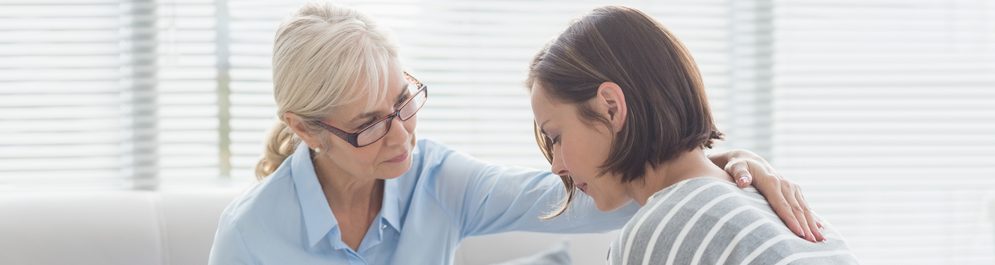 Counselor helping client